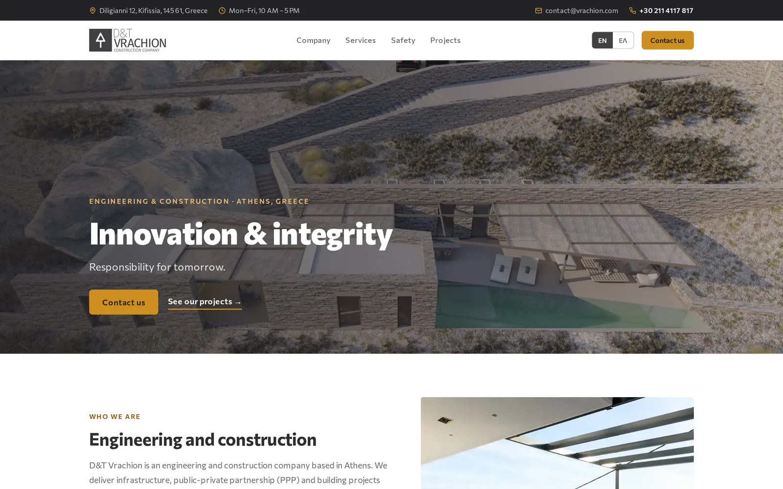 The D&T Vrachion home page: a topbar with address, hours, email and phone, the header with the language switch, and a photo hero of a stone villa with the headline Innovation & integrity